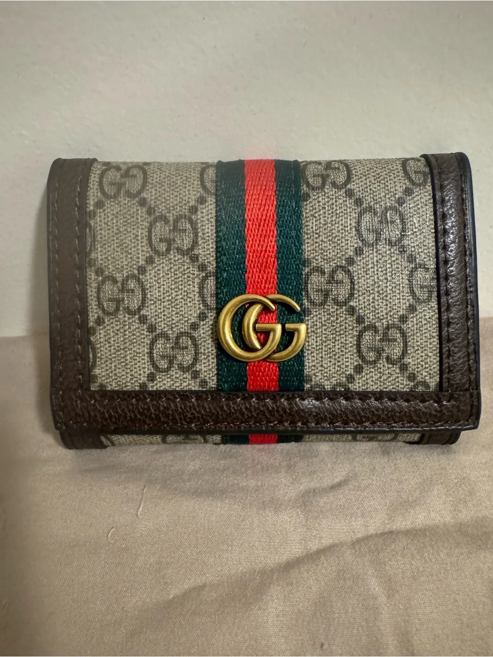 Gucci Black Leather Trifold Wallet with Gold Logo